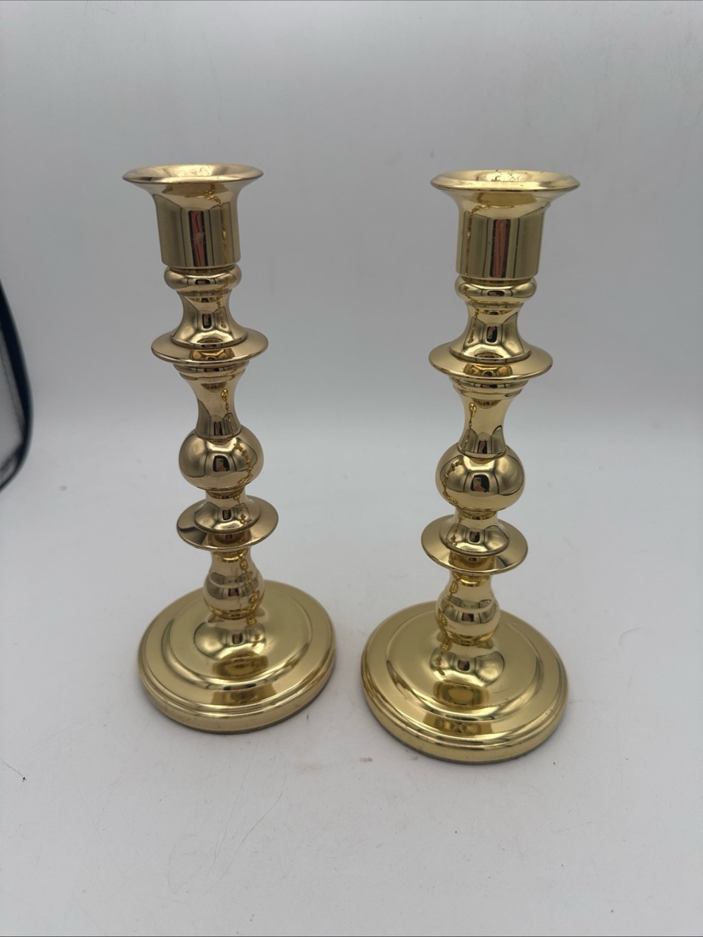 Pair Of Polished Brass Forged In Baldwin America Candle Stick Holders 7.75”